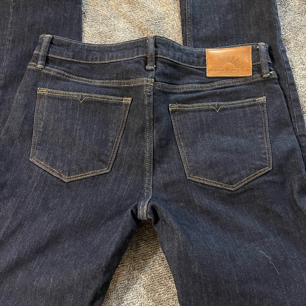 Rising sun denim size 32x34. Dark denim with classic stitching. Barely worn